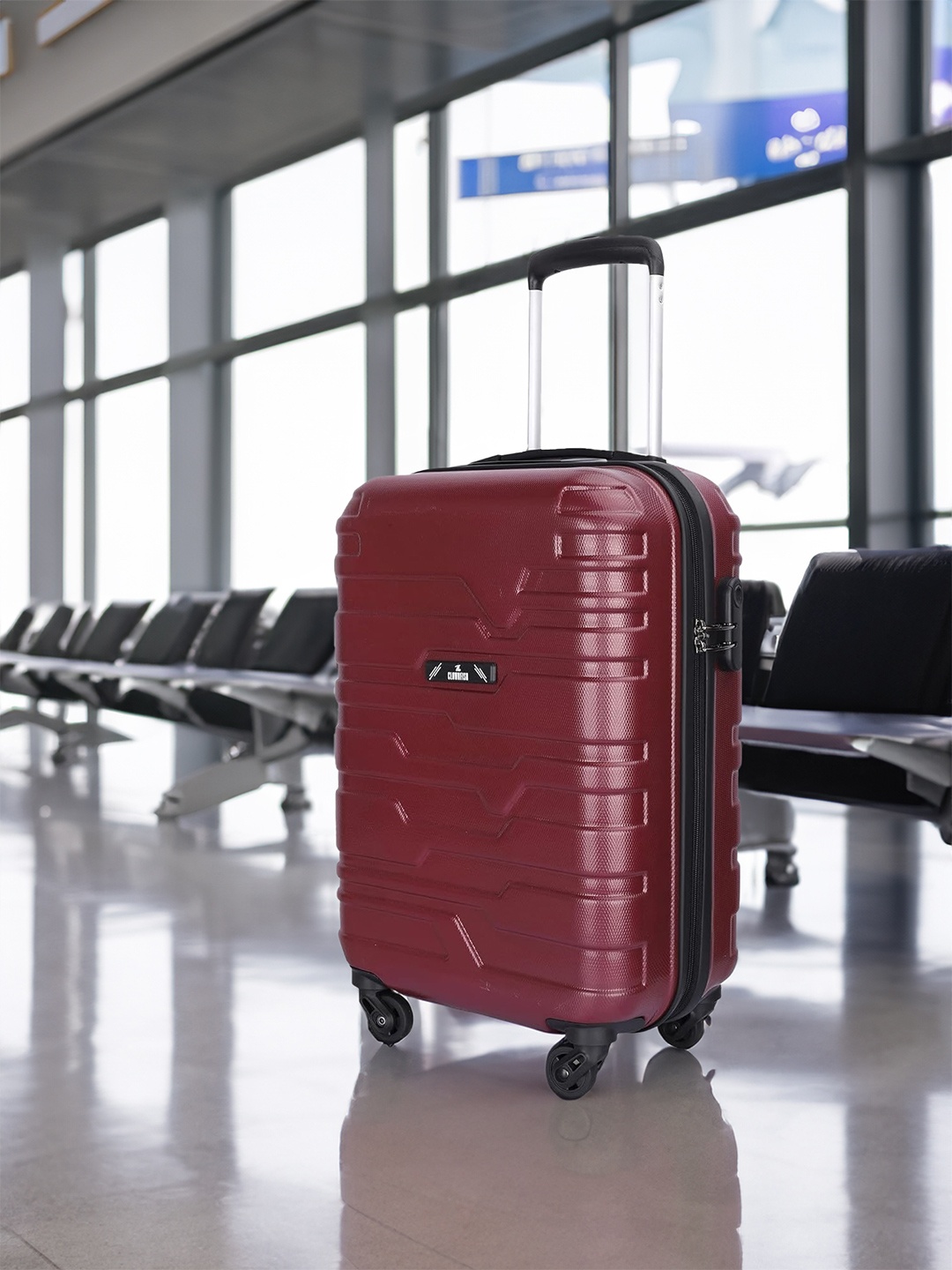 

THE CLOWNFISH Arsenio Textured Hard Case Medium Trolley Bag, Maroon