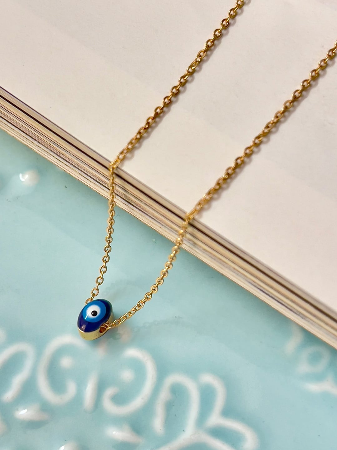 

Ayesha Gold Plated Evil Eye Oval Mini Pendant With Chain