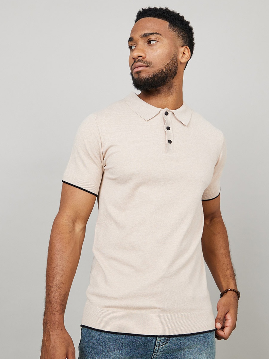 

Styli Men Solid Polo Collar Knitted Smart Fit T-shirt, Beige