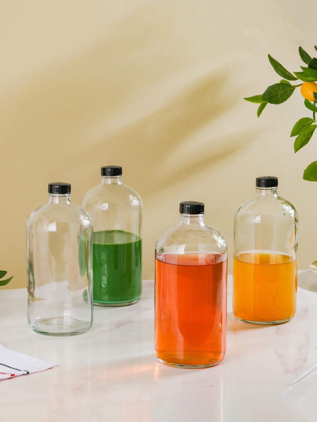 

Nestasia Transparent 4 Pieces Glass Water Bottles -1 L Each