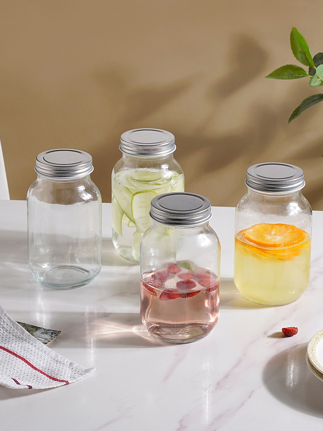 

Nestasia Transparent 4 Pieces Glass Storage Jars With Silver-Toned Lid - 750 ml Each