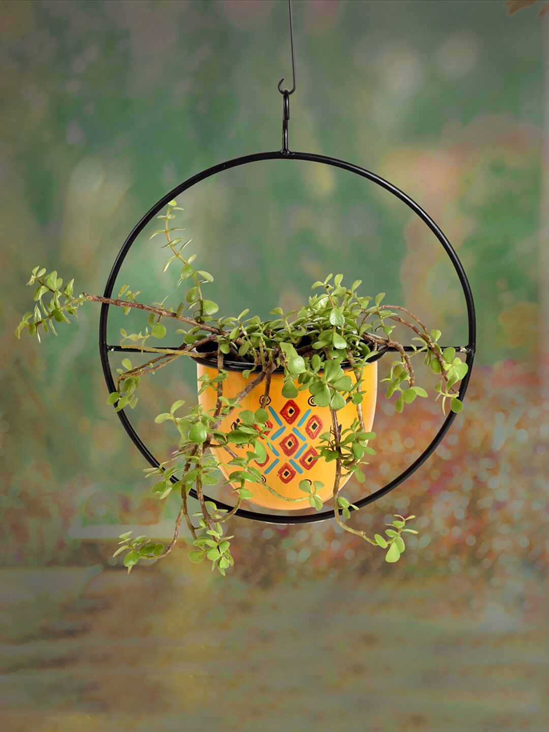 

AAKRITI ART CREATIONS Yellow & Black Printed Clay Hanging Planter