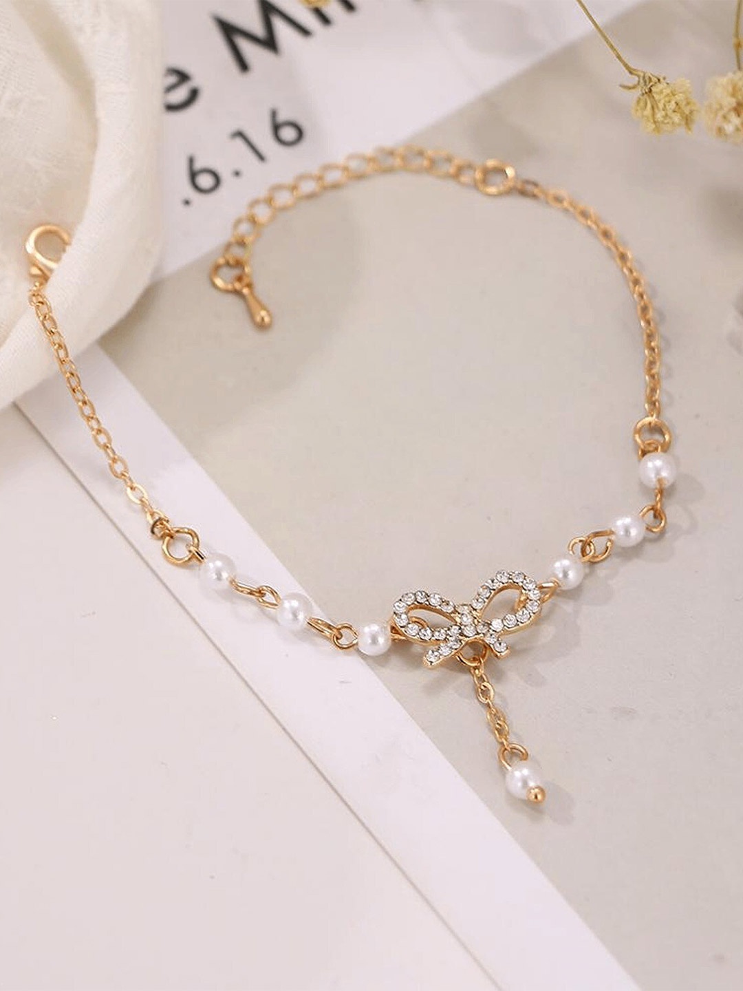 

Pinapes Gold-Plated Pearls Charm Bracelet