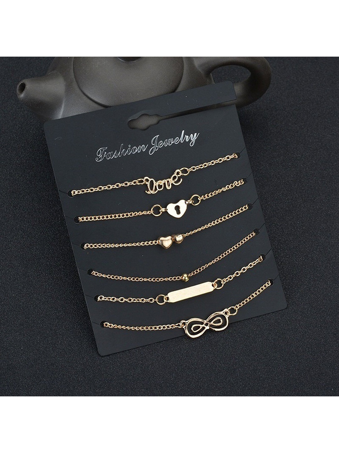 

Pinapes Set Of 6 Gold-Plated Oxidised Link Bracelet