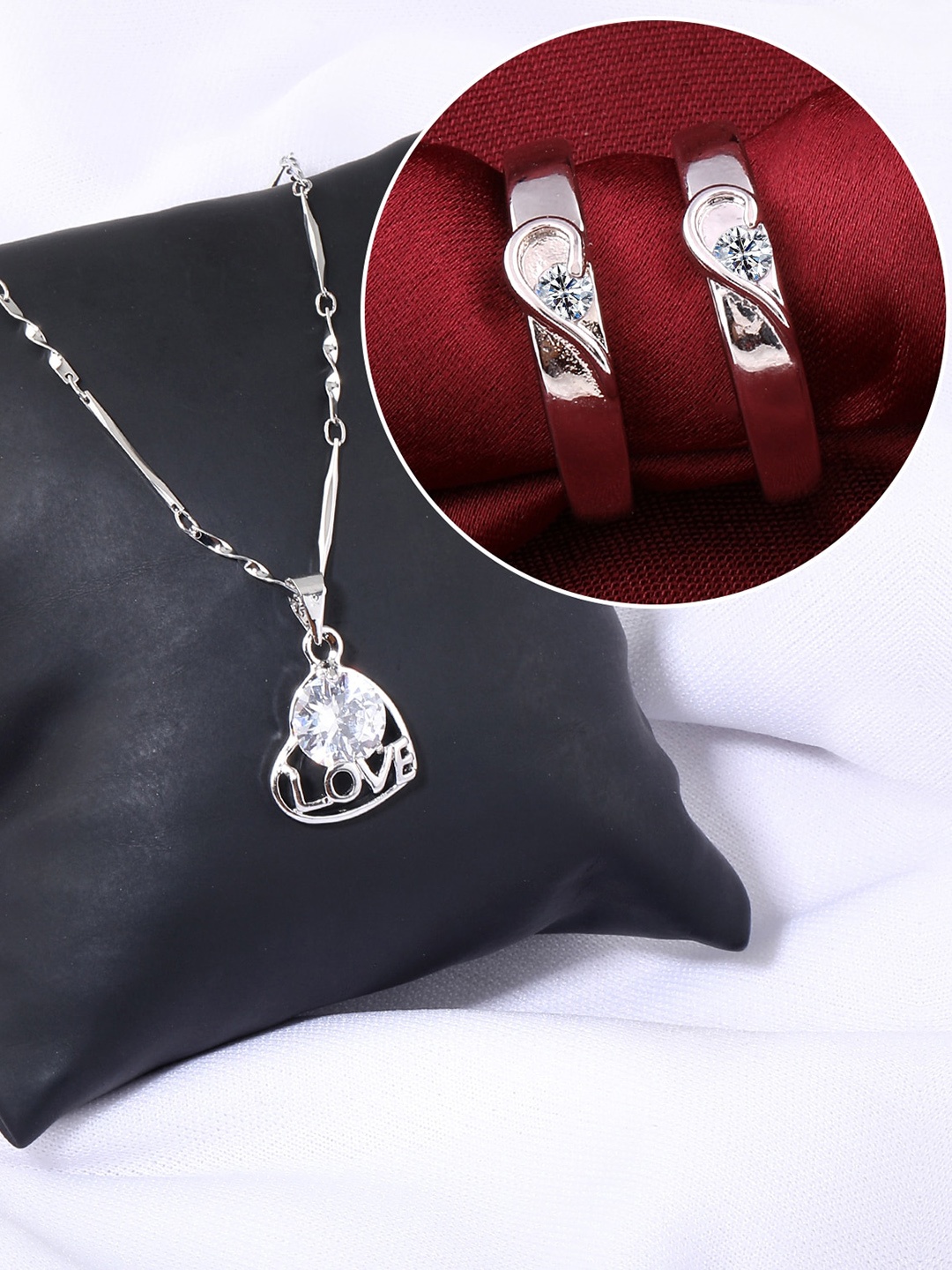 

Silver Shine Silver-Plated AD-Studded Couple Rings And Pendant Chain Jewellery Set