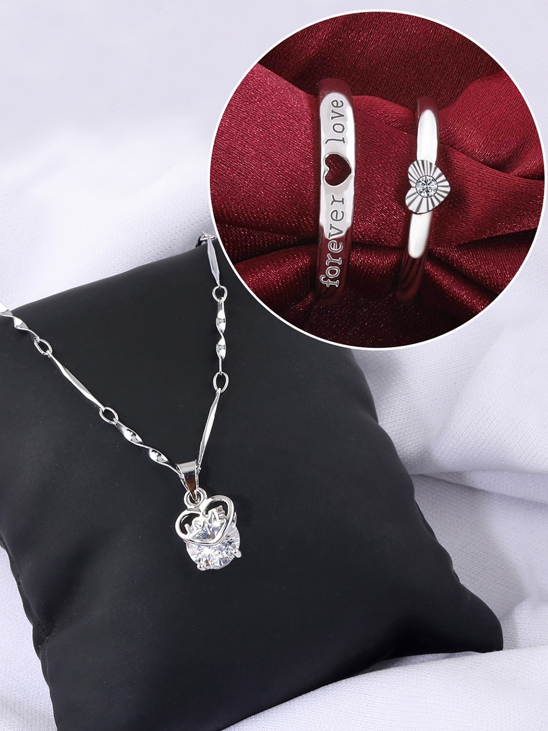 

Silver Shine Silver-Plated AD-Studded Couple Rings And Pendant Chain Jewellery Set