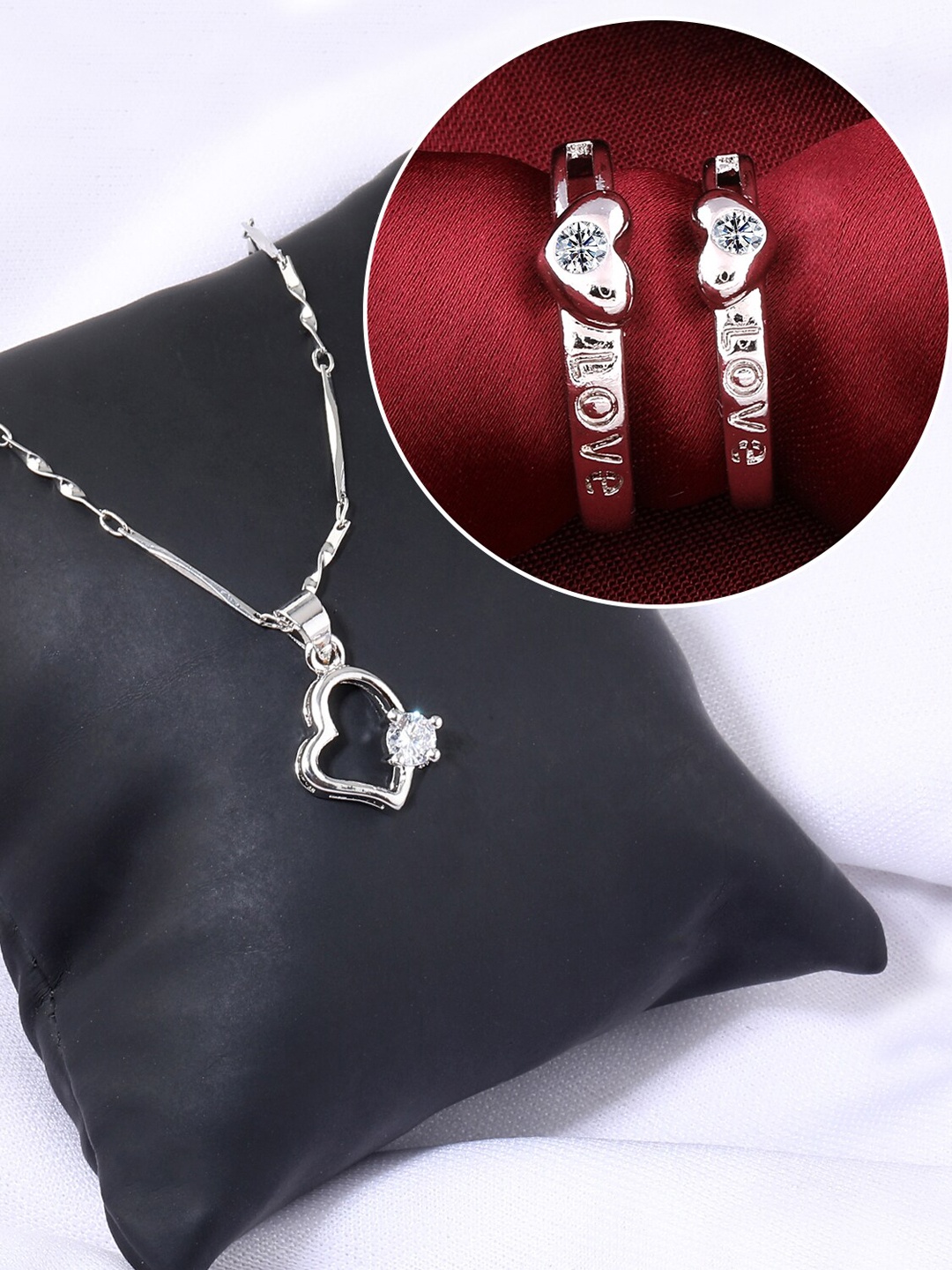 

Silver Shine Silver-Plated AD-Studded Couple Rings And Pendant Chain Jewellery Set