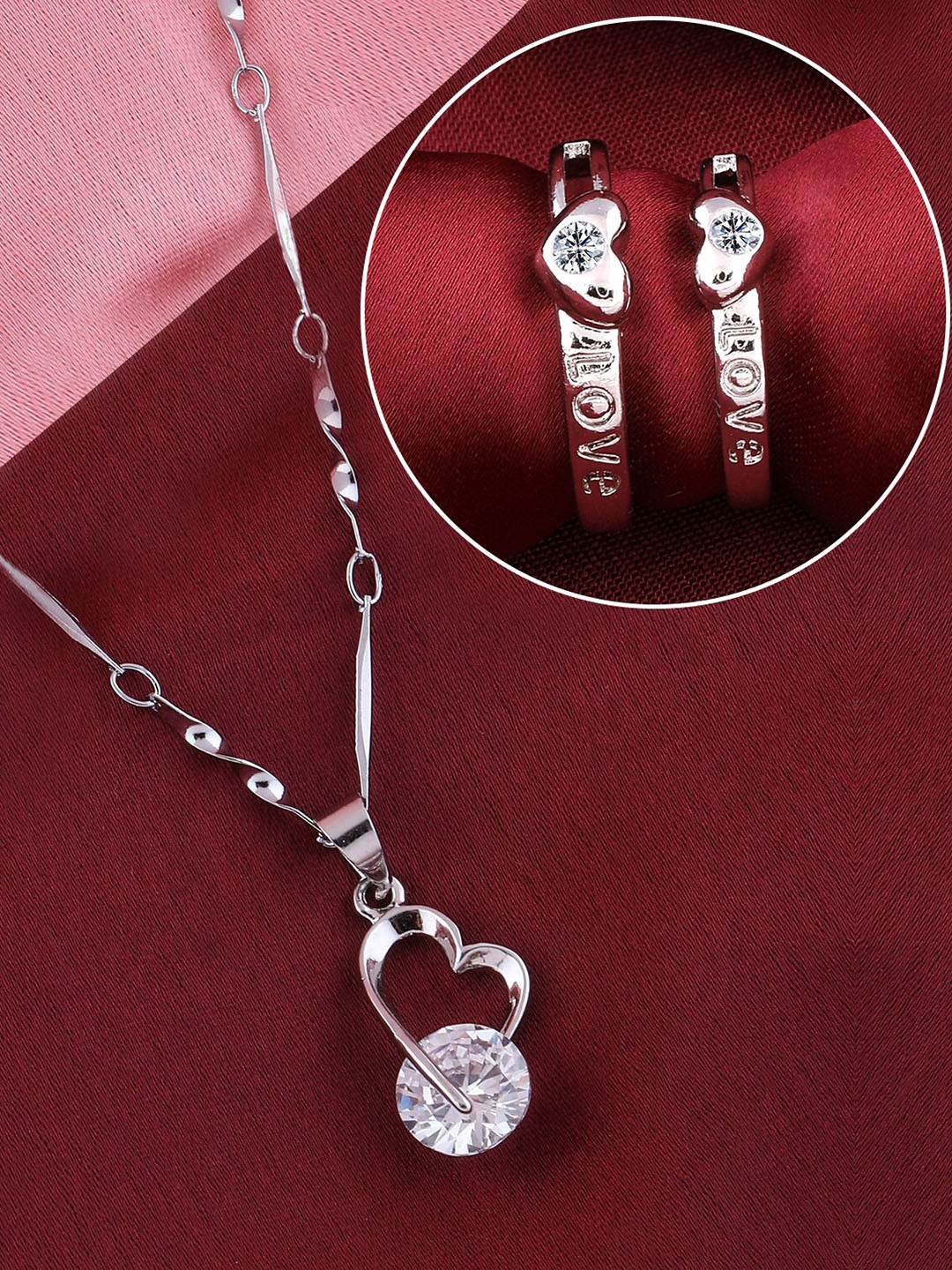 

Silver Shine Silver-Plated AD-Studded Couple Rings And Pendant Chain Jewellery Set
