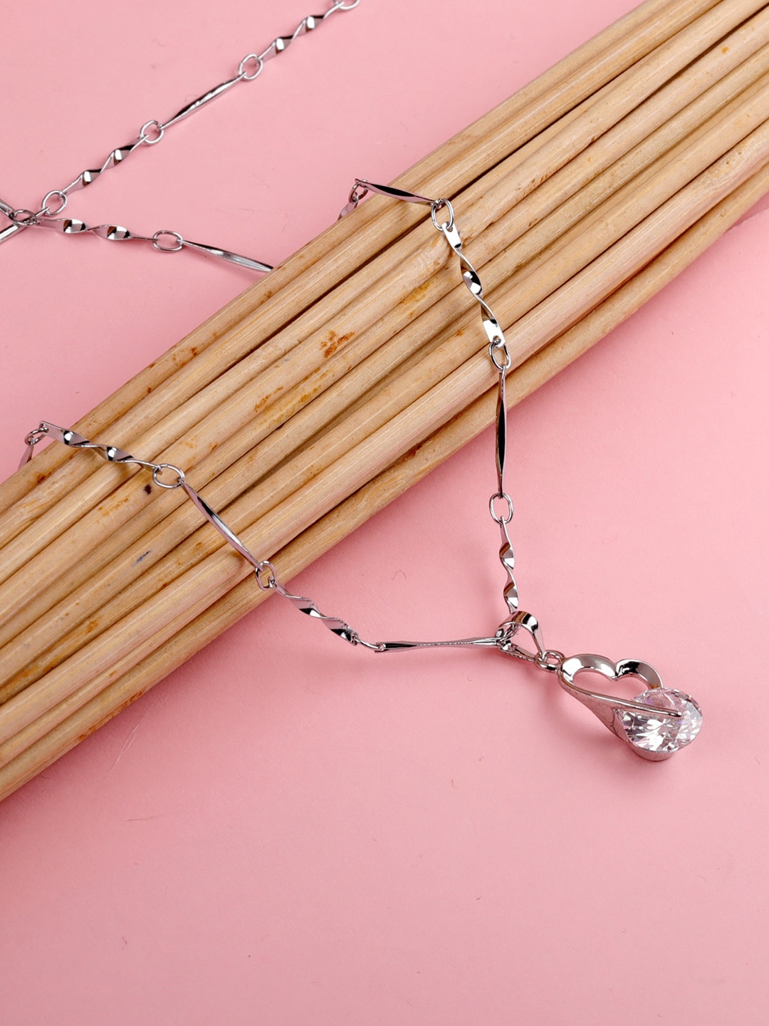 

Silver Shine Silver-Plated AD-Studded Couple Rings And Pendant Chain Jewellery Set