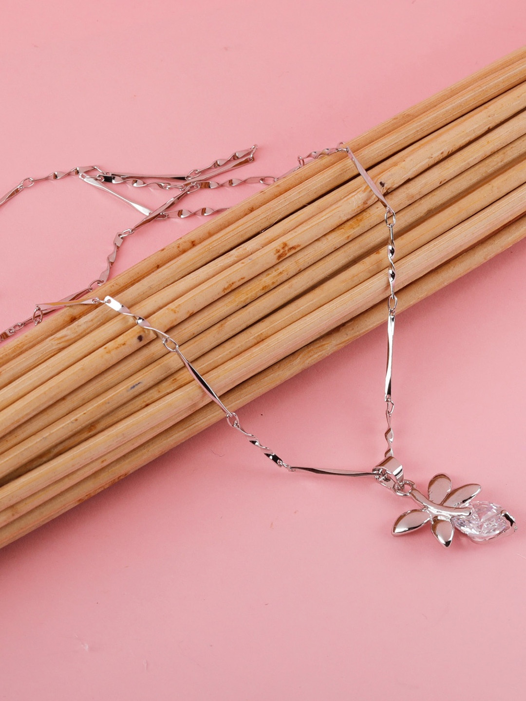 

Silver Shine Silver-Plated AD-Studded Couple Rings And Pendant Chain Jewellery Set