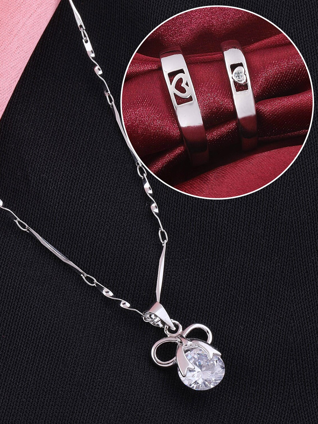 

Silver Shine Silver-Plated AD-Studded Couple Rings And Pendant Chain Jewellery Set