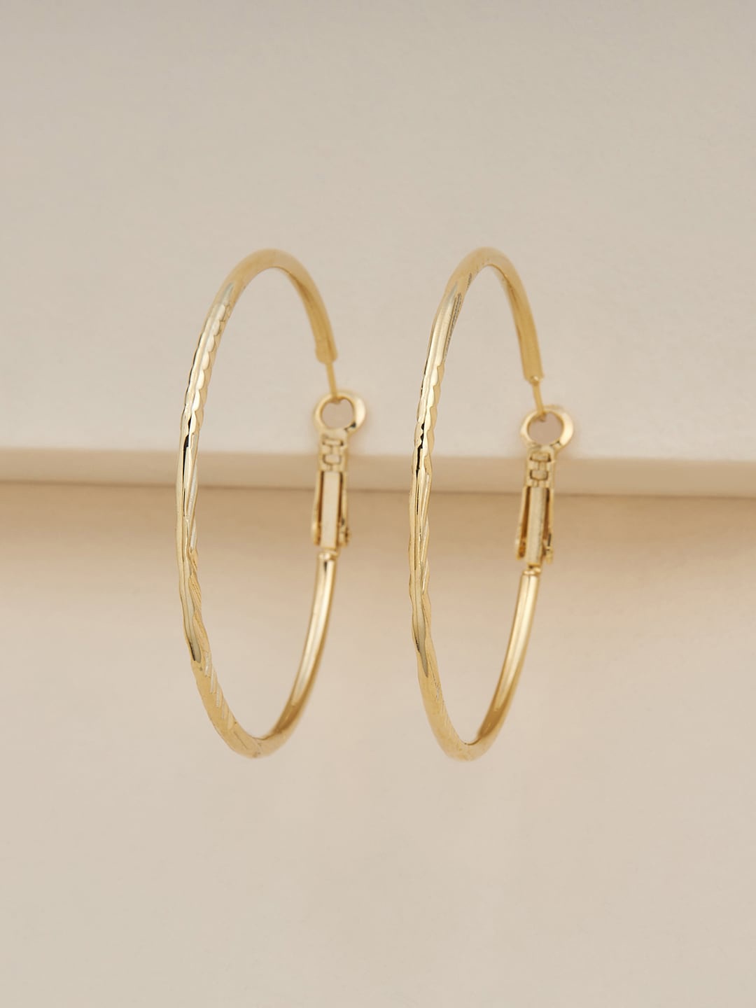 

Kushal's Fashion Jewellery Gold Plated Circular Hoop Earrings