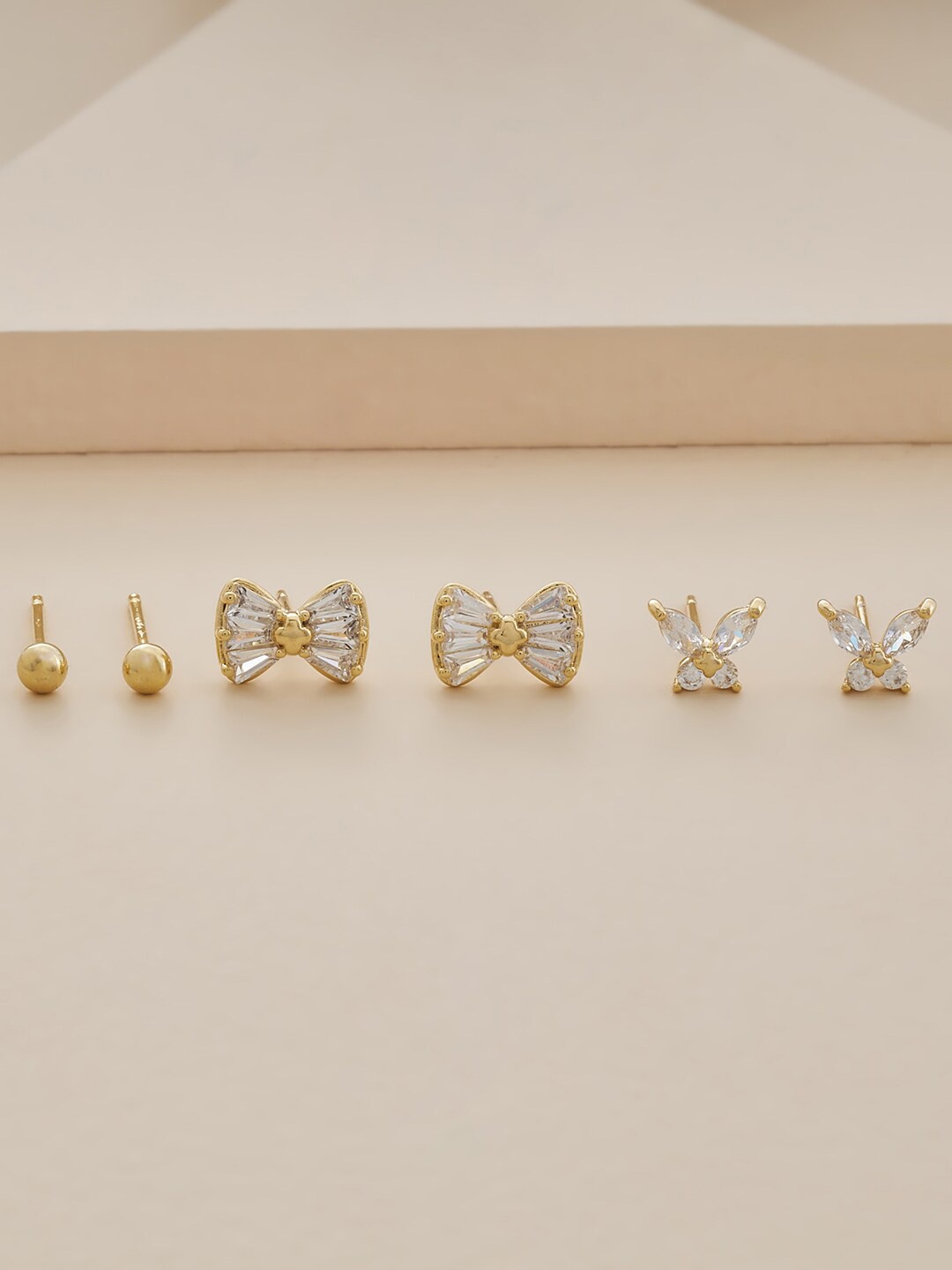 

Kushal's Fashion Jewellery Gold-Plated Contemporary Studs Earrings