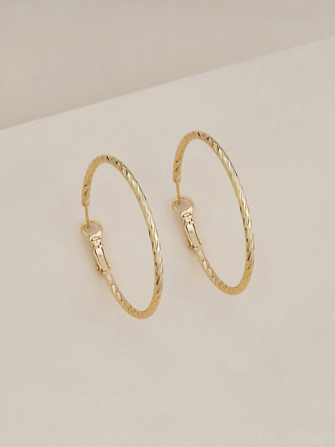 

Kushal's Fashion Jewellery Gold-Plated Circular Hoop Earrings