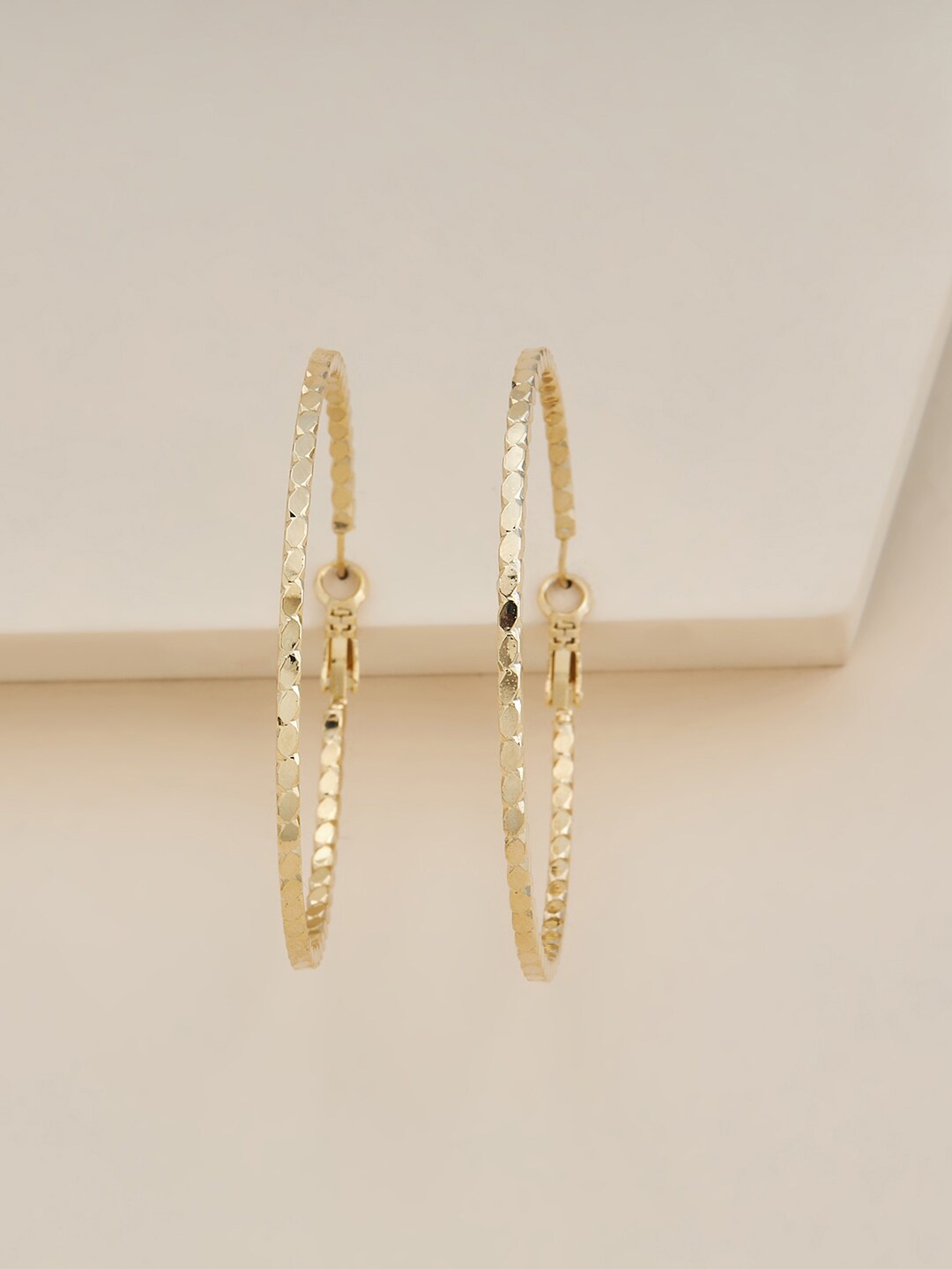 

Kushal's Fashion Jewellery Gold Plated Contemporary Hoop Earrings