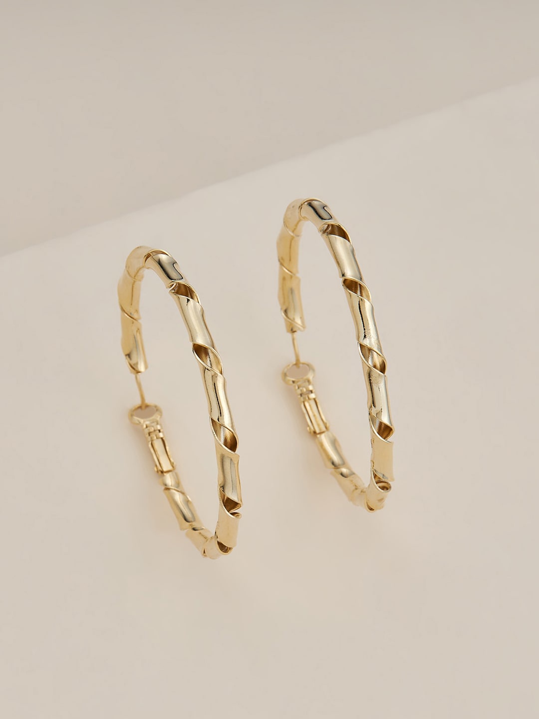 

Kushal's Fashion Jewellery Gold Plated Circular Hoop Earrings