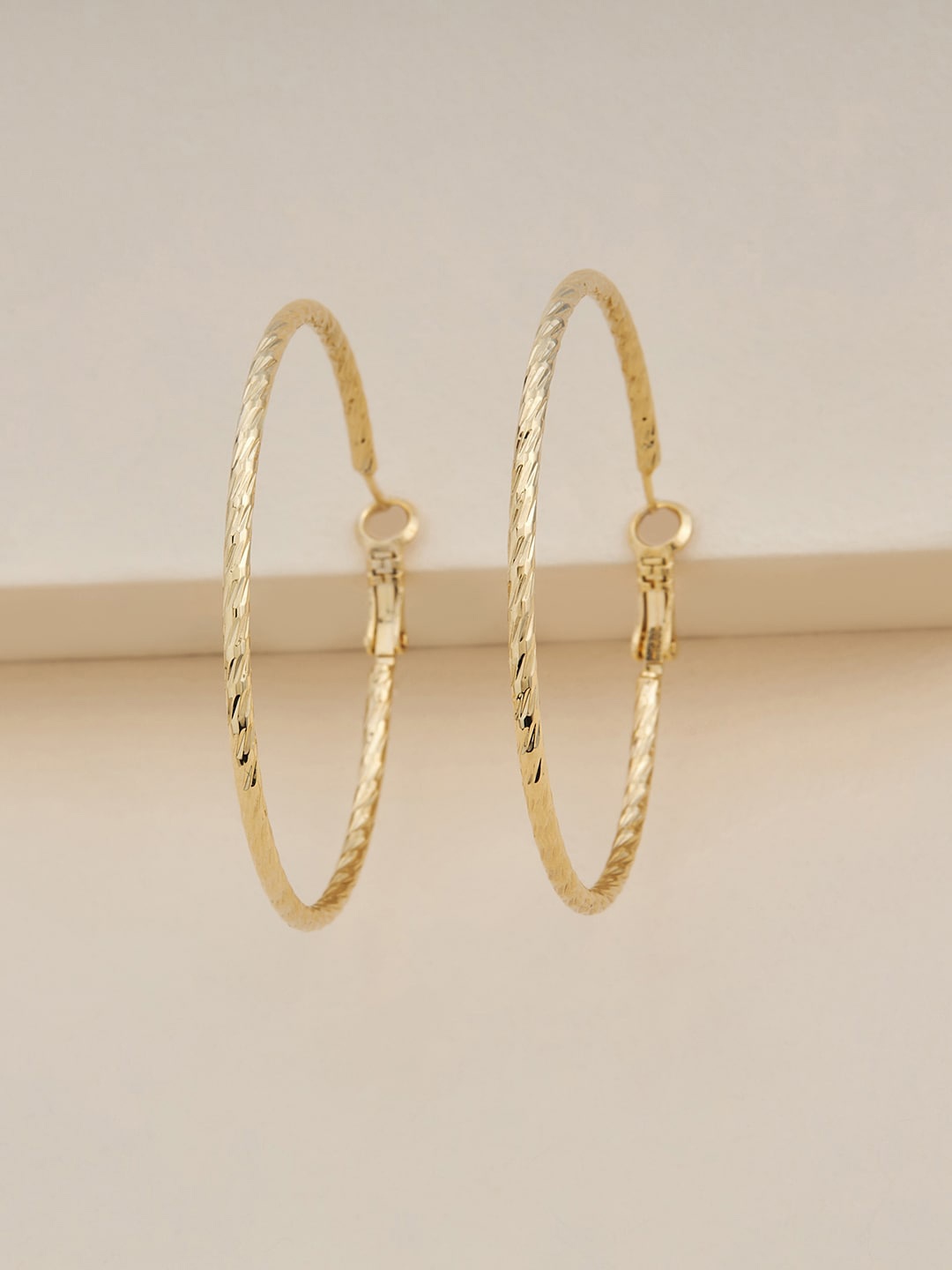 

Kushal's Fashion Jewellery Gold Plated Circular Hoop Earrings
