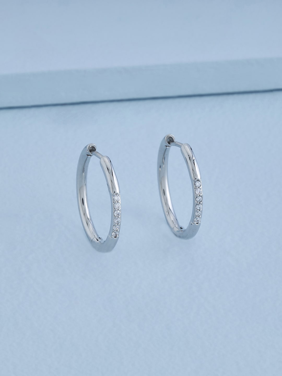 

Kushal's Fashion Jewellery Silver-Plated Contemporary Hoop Earrings