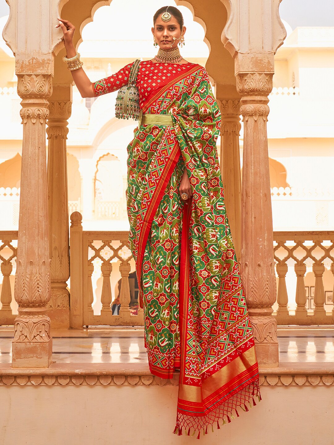 

Anouk Ethnic Motifs Printed Zari Ikat Saree, Green