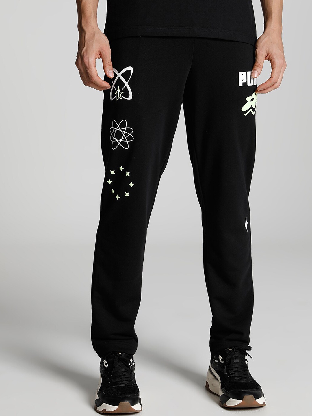 

Puma X 1DER Men Classic Graphic Printed Regular Fit Cotton Track Pants, Black