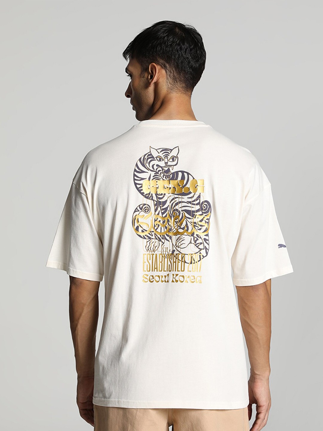 

Puma Gen.G Logo-Printed Oversized-Fit Knitted Cotton T-Shirt, Cream