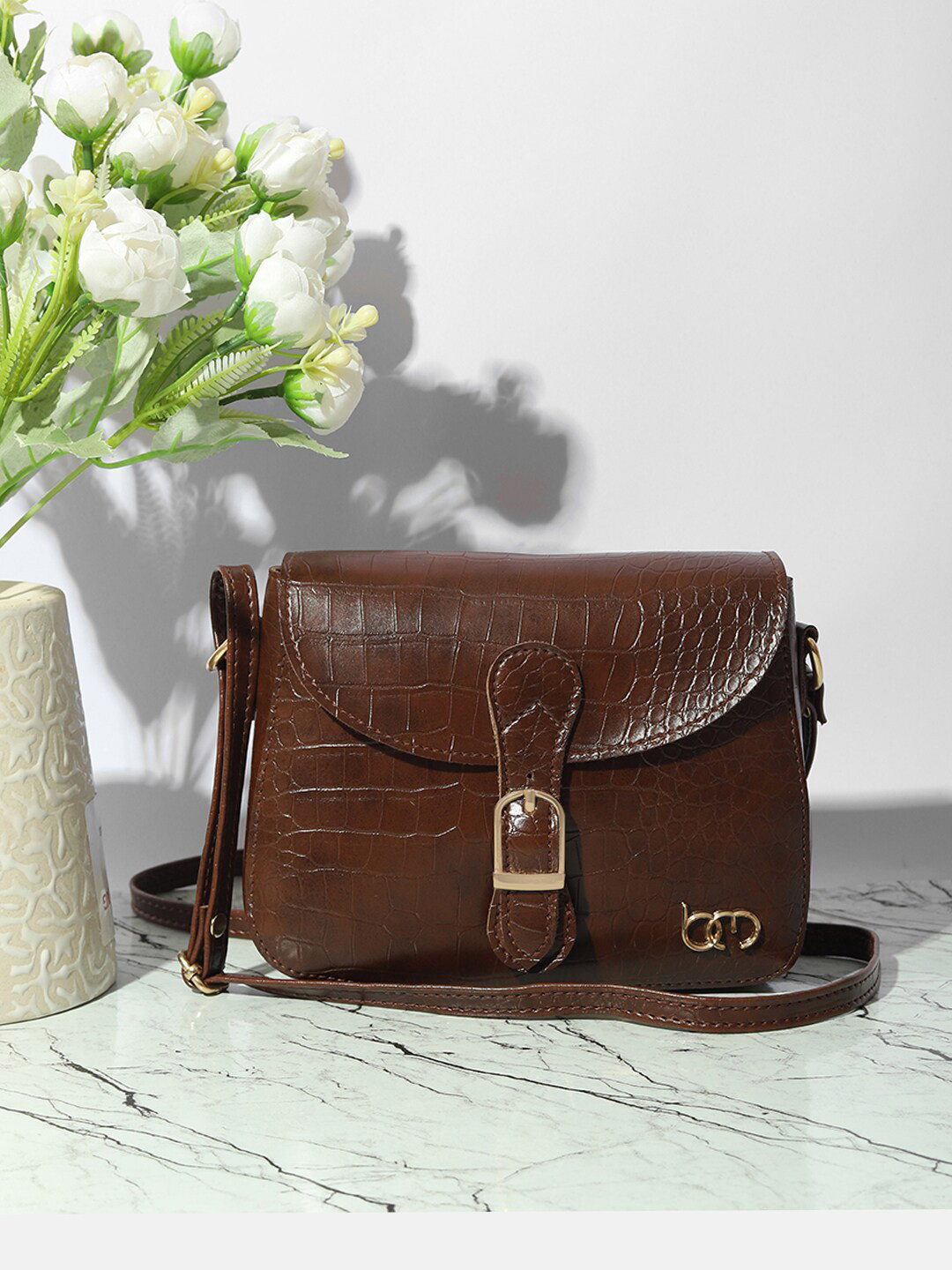 

Bagsy Malone Women Animal Textured PU Structured Sling Bag With Buckle, Brown