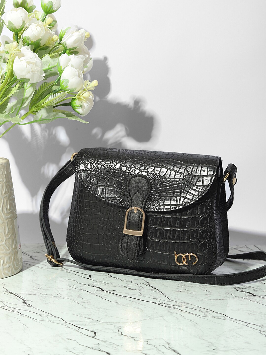 

Bagsy Malone Women Textured Sling Bag, Black