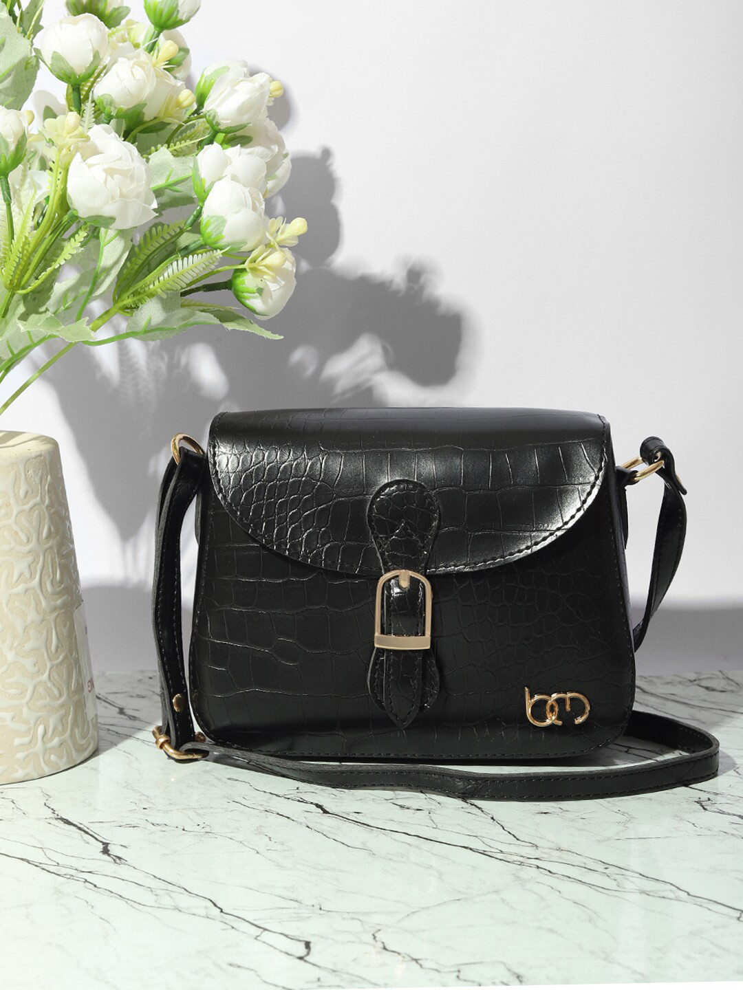 

Bagsy Malone Women Animal Textured PU Structured Sling Bag With Buckle, Black