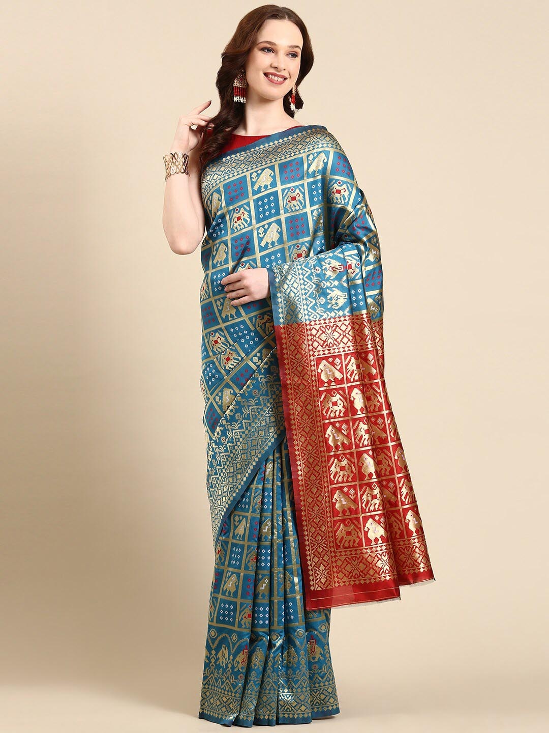 

Anouk Ethnic Motif Woven Design Zari Patola Saree, Turquoise blue