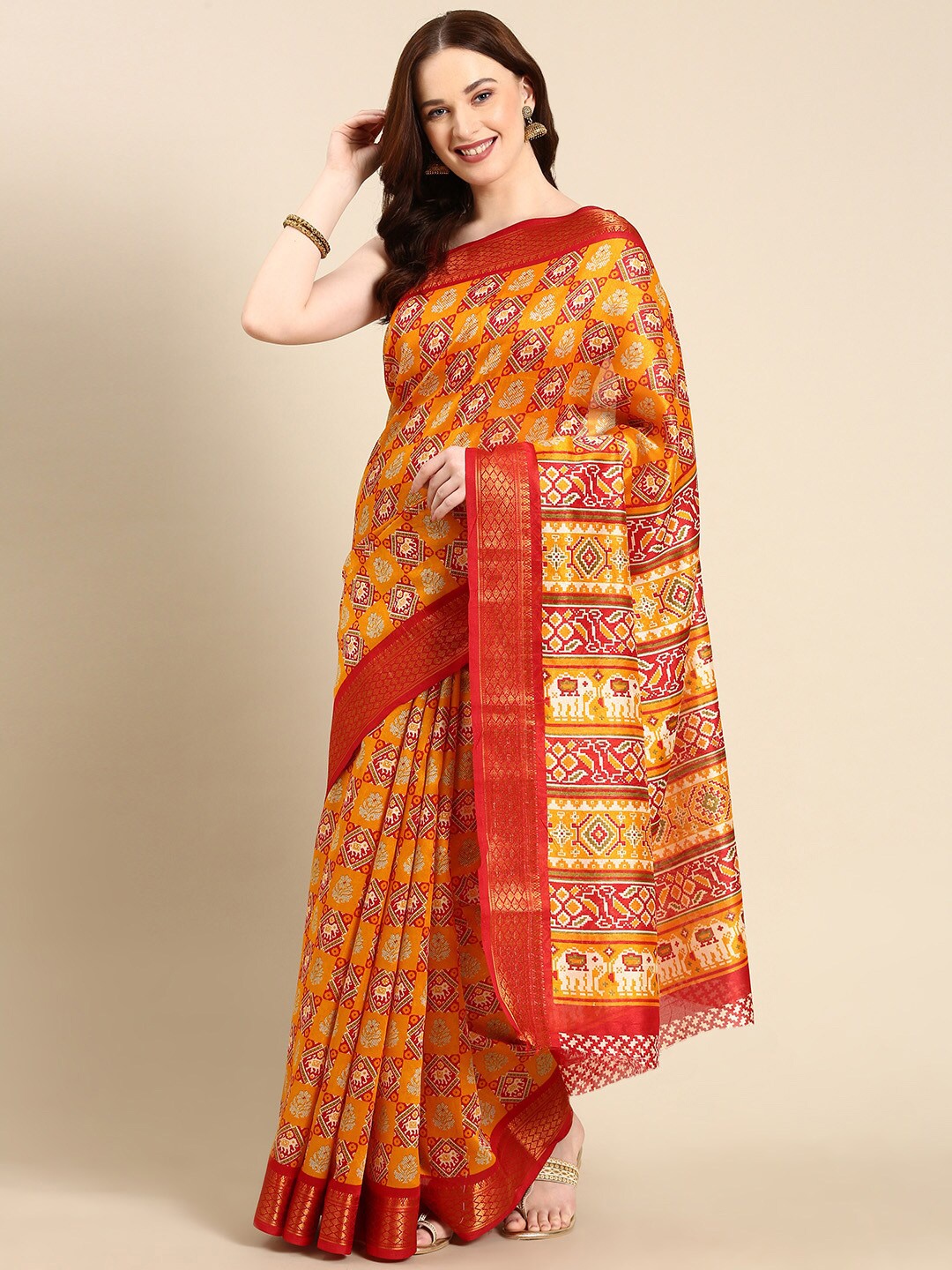 

Anouk Ethnic Motifs Printed Zari Patola Saree, Yellow