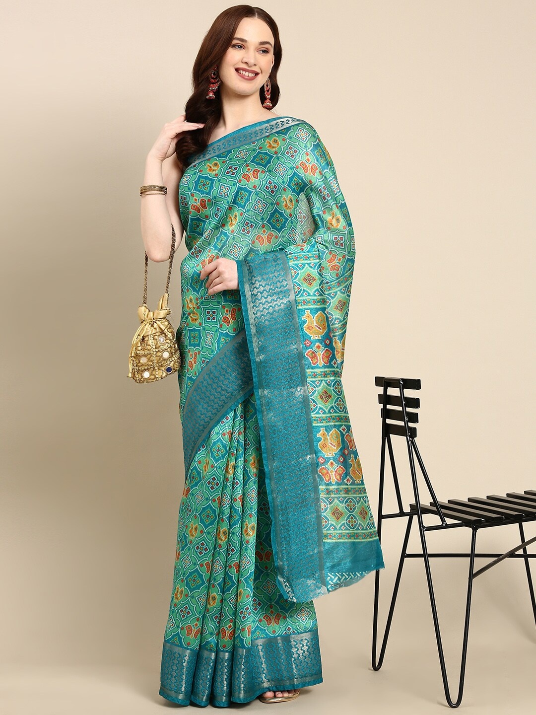 

Anouk Ethnic Motifs Printed Zari Patola Saree, Sea green
