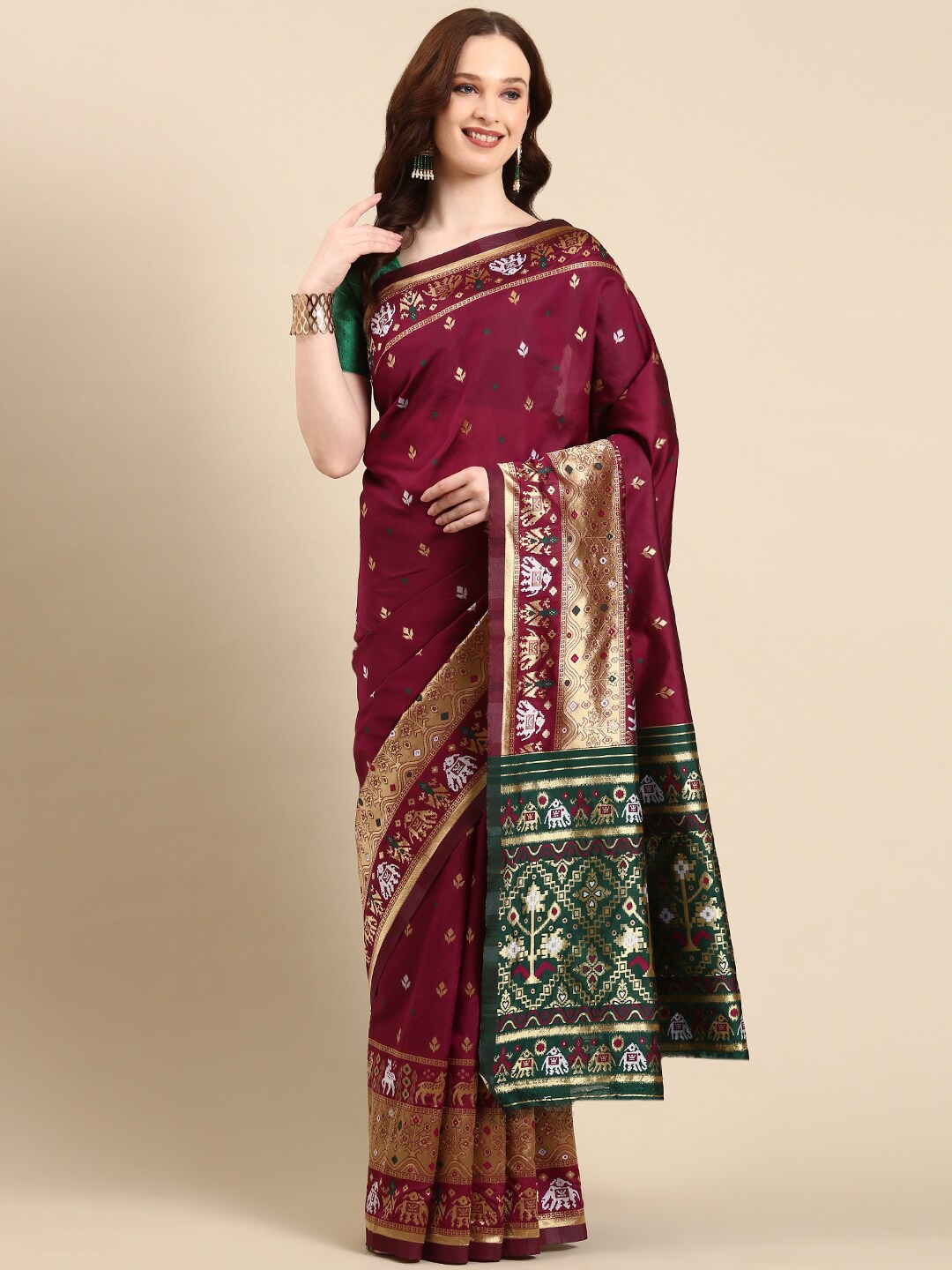 

Anouk Ethnic Motifs Printed Zari Patola Saree, Magenta