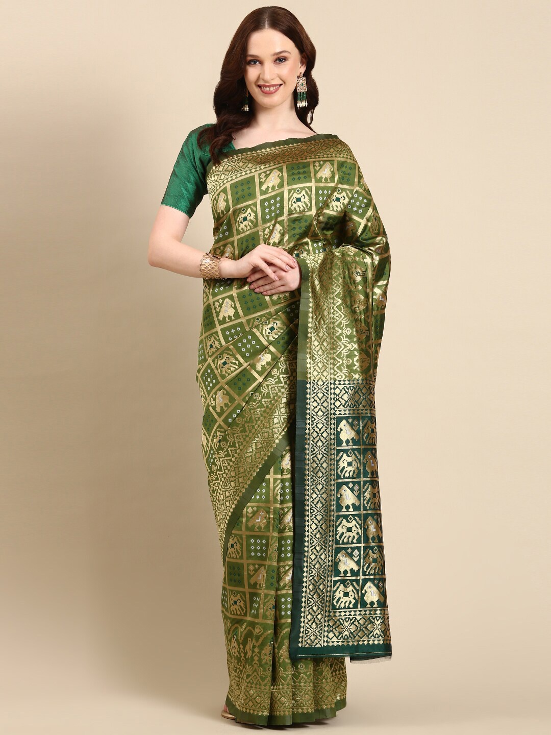 

Anouk Ethnic Motifs Woven Design Zari Patola Saree, Green