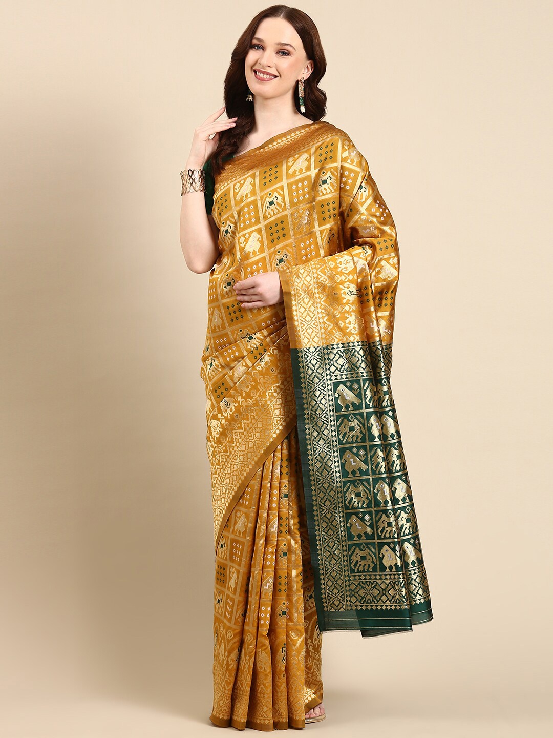 

Anouk Ethnic Motifs Woven Design Zari Patola Saree, Yellow