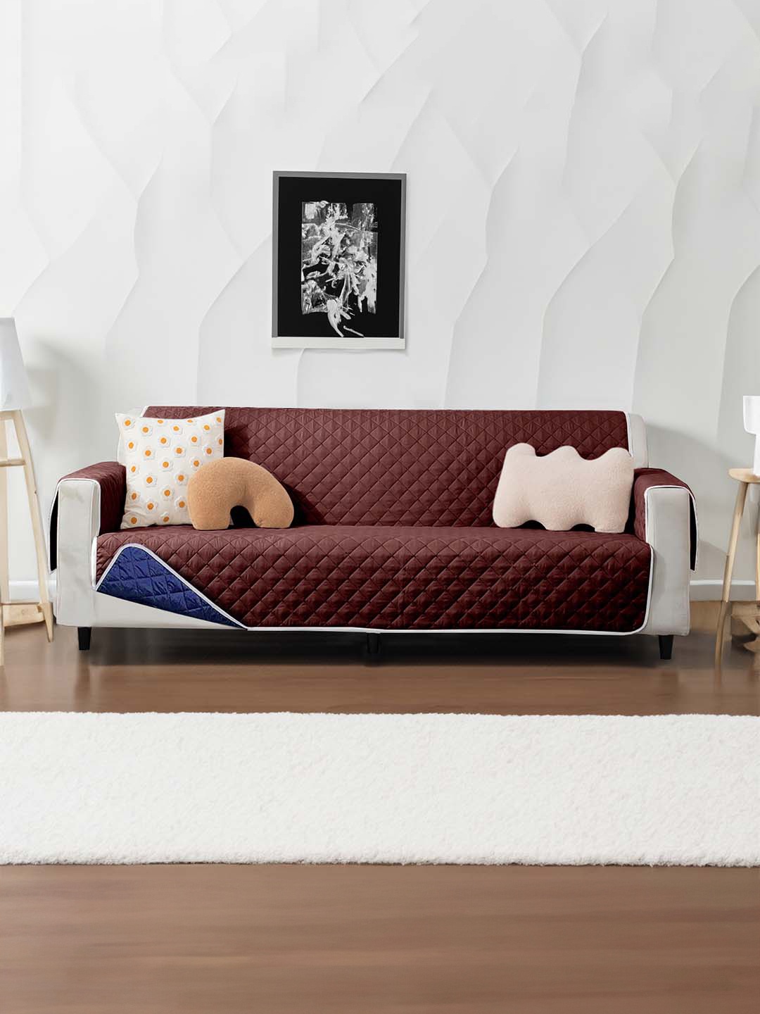 

Cortina Brown & Navy Blue Quilted Three Seater Reversible Sofa Cover With Arms