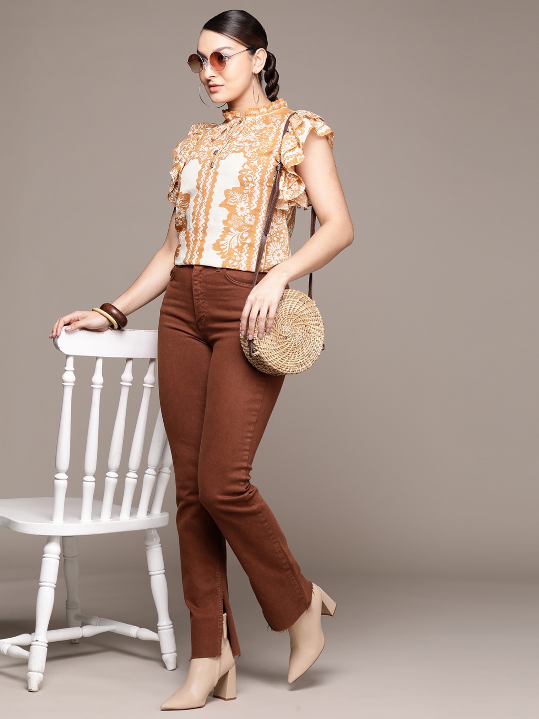 

Label Ritu Kumar Floral Print Tie-Up Neck Flared Sleeves Ruffles Cotton Top, Beige