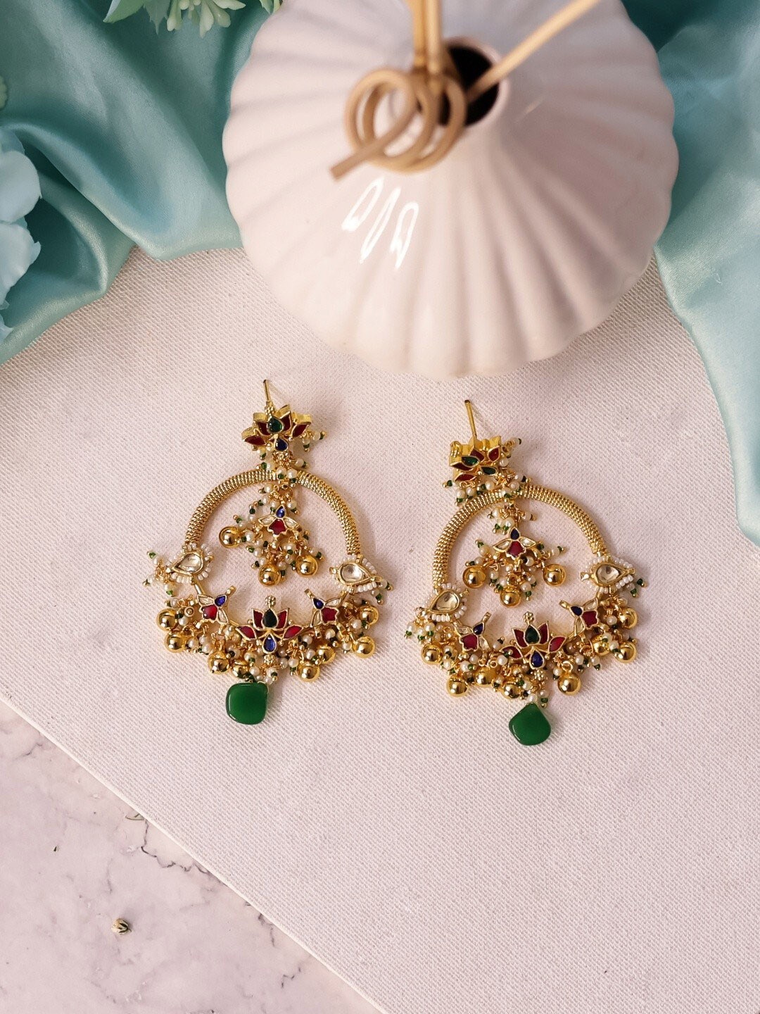 

Ishhaara Gold Plated Crescent Shaped Studs Earrings, Green