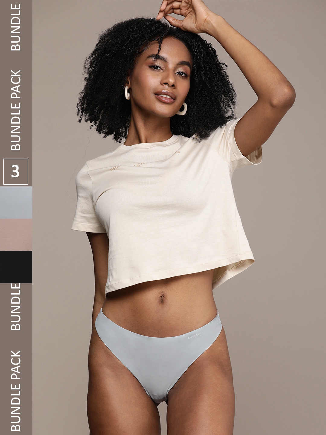 

Calvin Klein Underwear Women Seamless Solid Pack Of 3 Thongs QD3558BU1, Grey