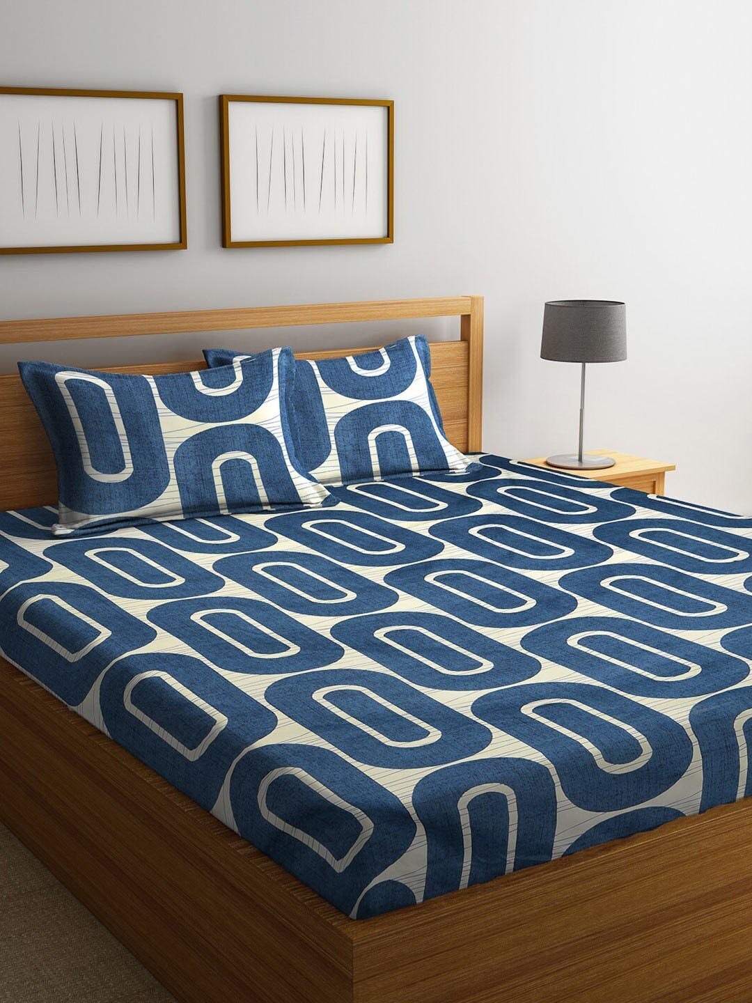 

CHHAVI INDIA Blue & White Geometric Printed 210 TC Queen Bedsheet & Pillow Covers