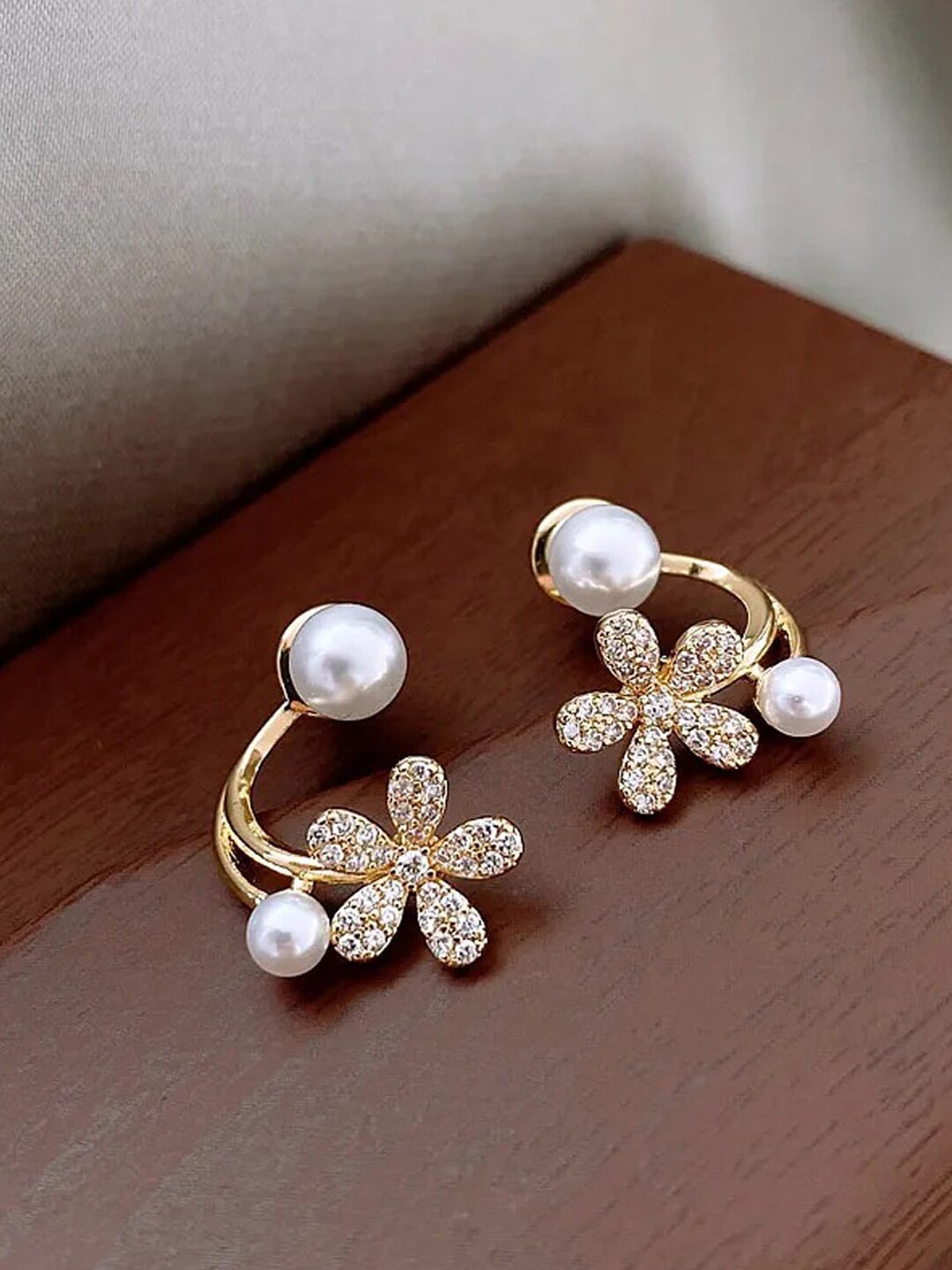 

Jewels Galaxy Gold-Plated Floral Pearl Studs Earrings