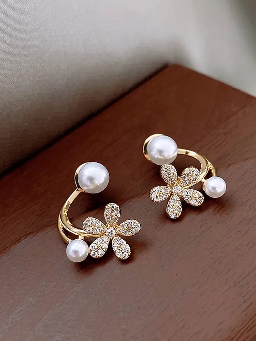 

Jewels Galaxy Gold-Plated Floral Pearl Studs Earrings