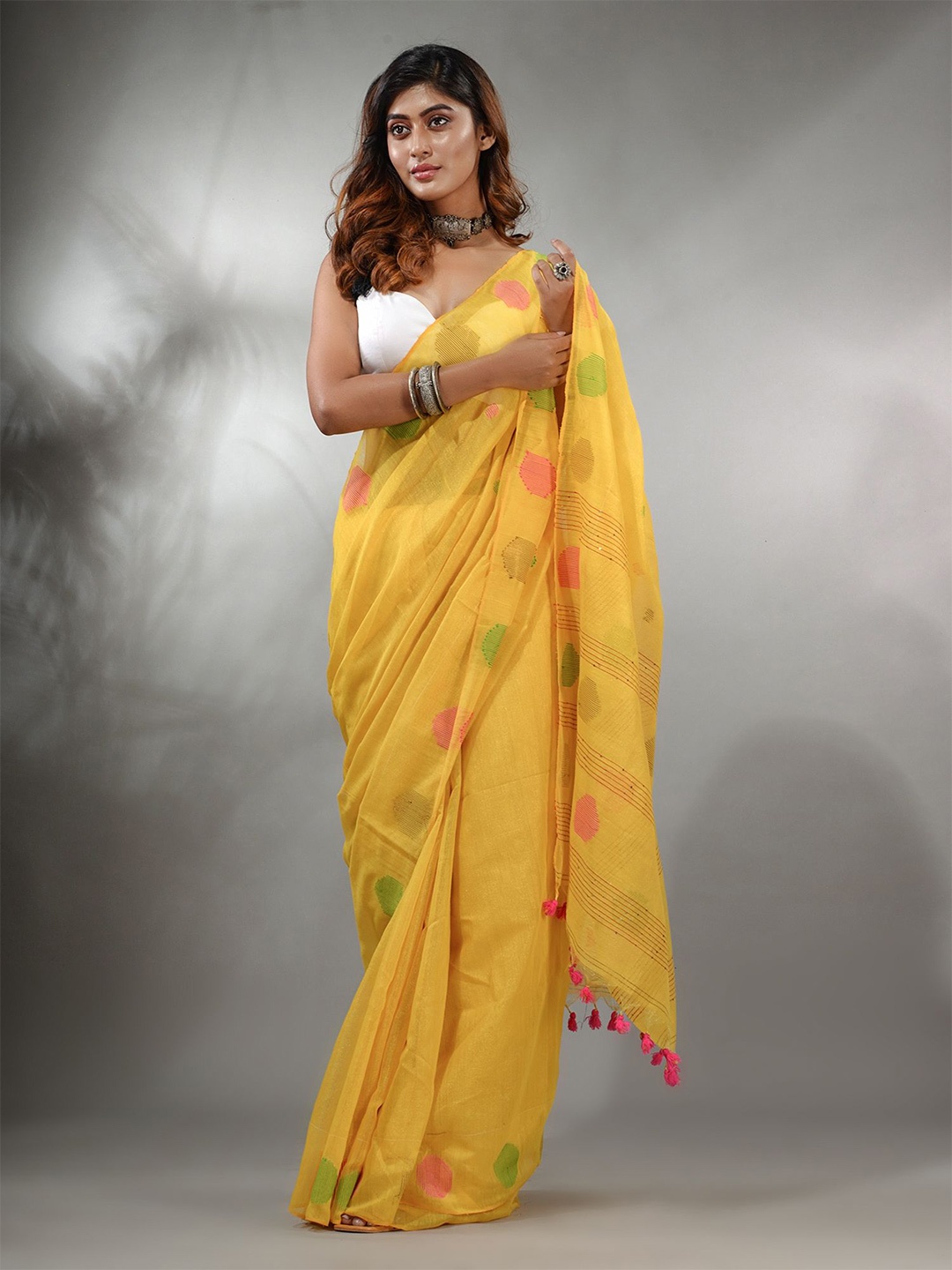 

Charukriti Woven Design Tissue Saree, Yellow