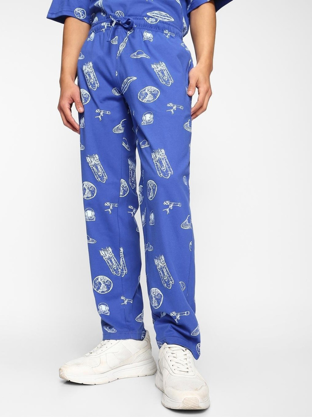 

Bewakoof Men All Over Printed Mid Rise Cotton Trousers, Blue