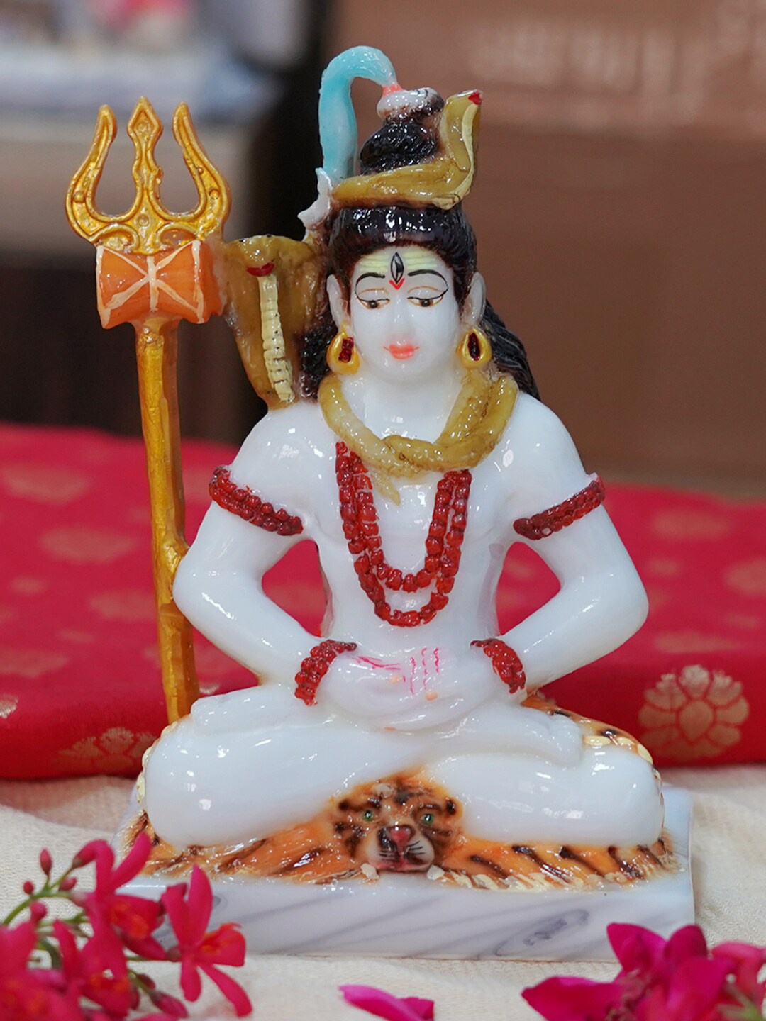 

Gallery99 White & Red Shiv Ji Painted Idol Showpiece