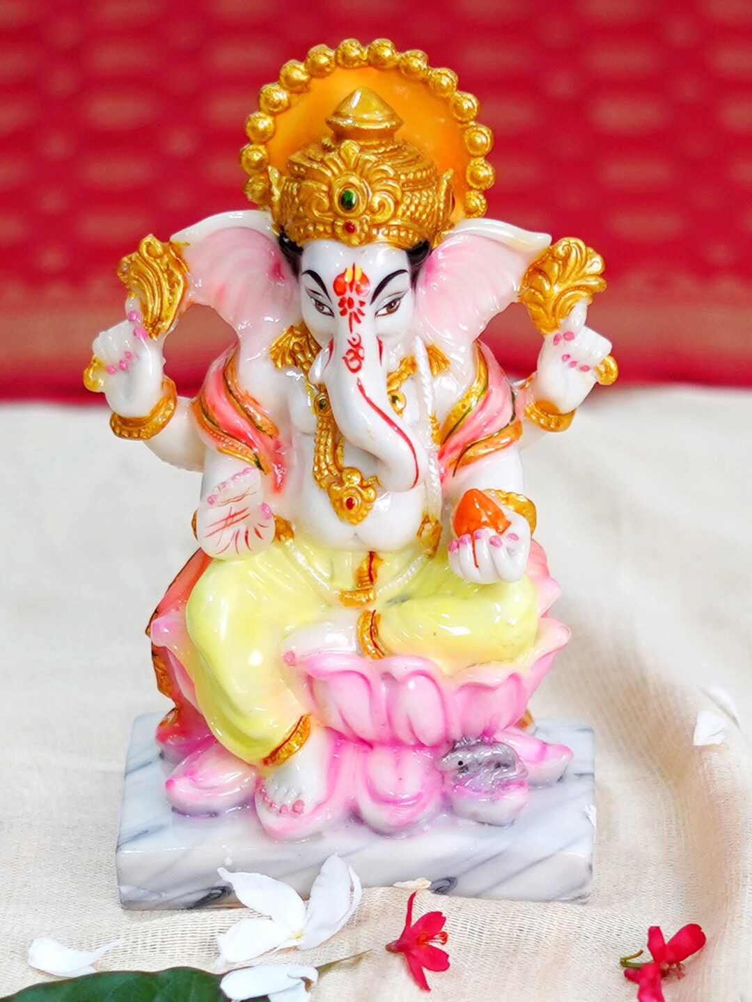 

Gallery99 Yellow & Pink Ganesh Painted Idol Showpiece