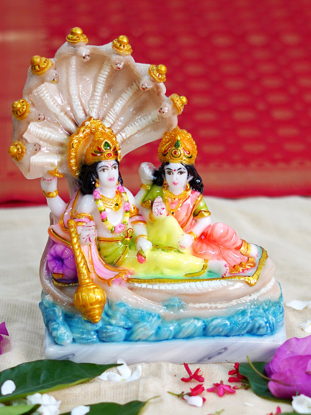 

Gallery99 White & Blue Vishnu Laxmi Idol Showpiece
