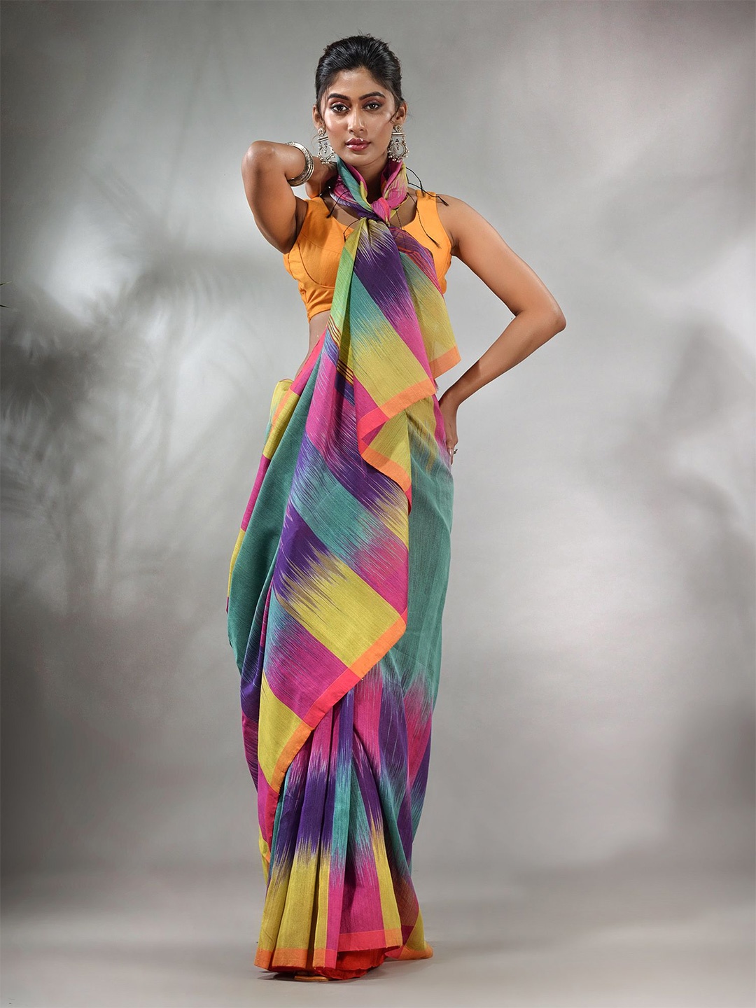 

Charukriti Colourblocked Ikat Saree, Teal