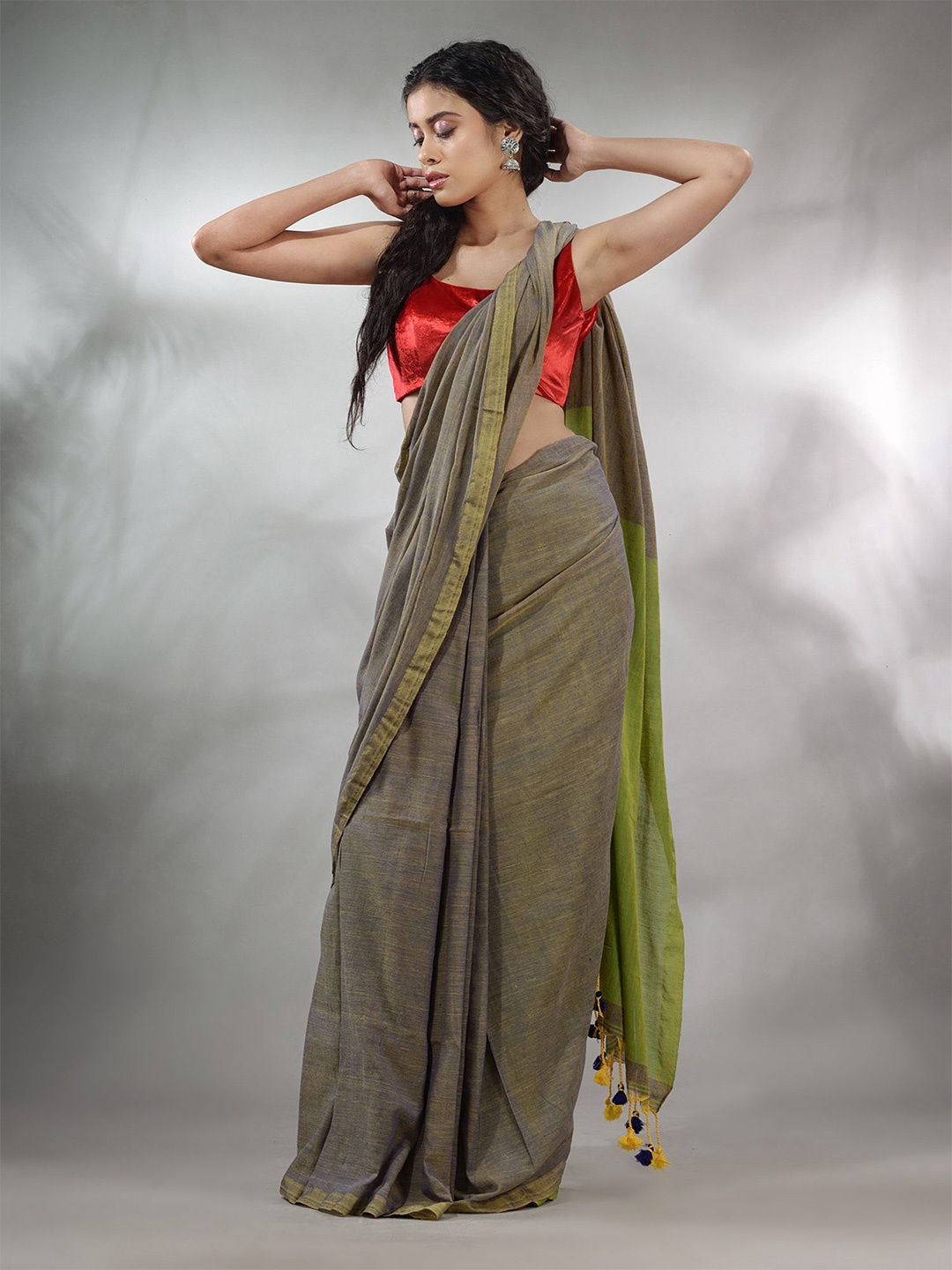 

Charukriti Olive Green Pure Cotton Saree