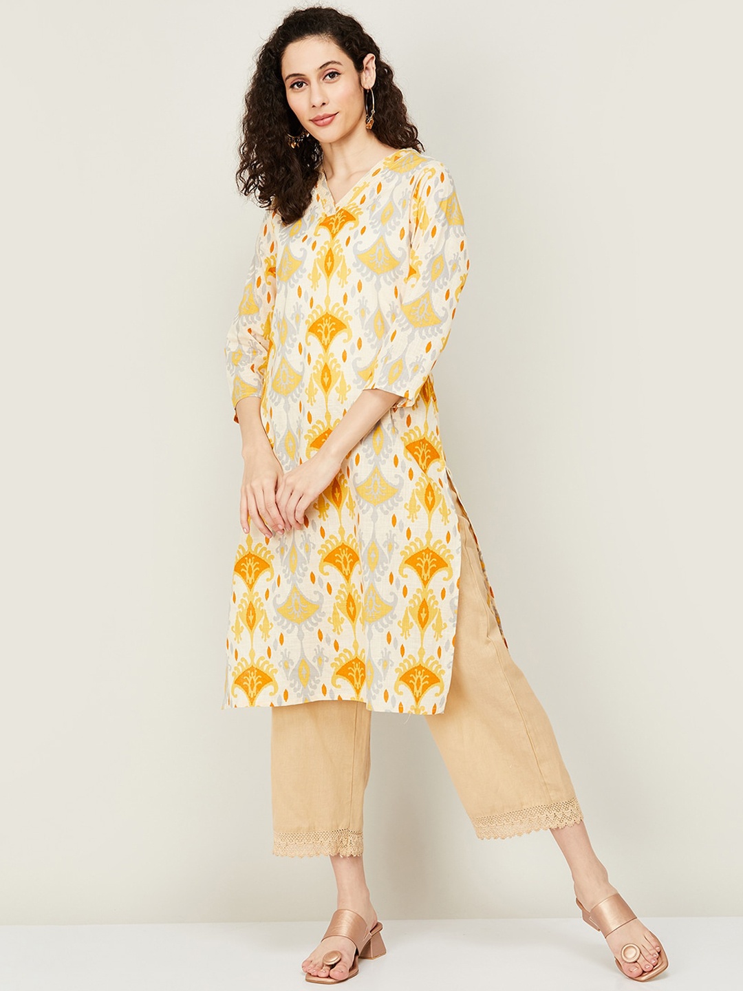 

Melange by Lifestyle Ethnic Motifs Printed Thread Work Pure Cotton Kurta, Mustard