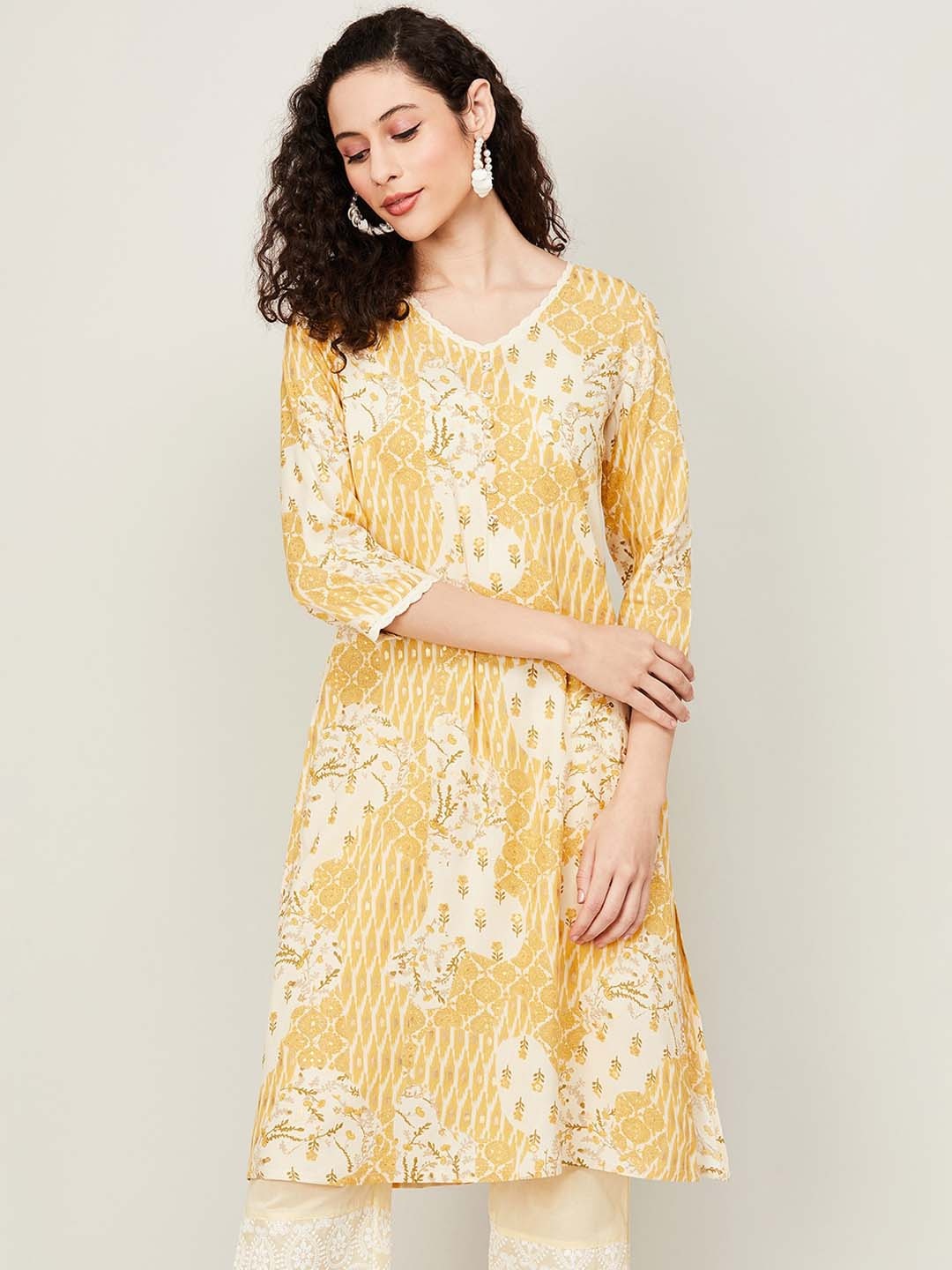 

Melange by Lifestyle Women Floral Printed V Neck Straight Kurta, Yellow